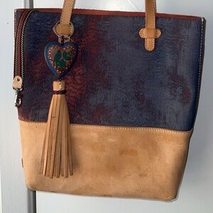 Consuela Navy and Tan Leather Tote with Tassel Charm